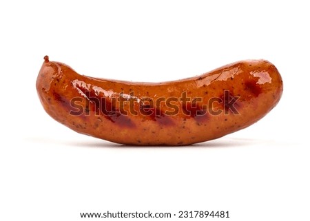 Grilled bratwurst Pork Sausages with basil leaves, close-up, isolated on white background