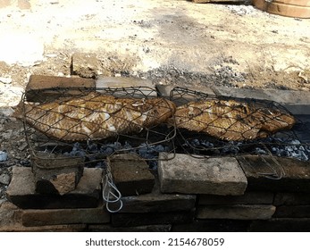 Grilled Carp On A Traditional Stove