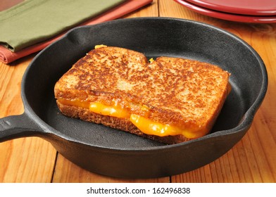 Grilled cheese sandwich in a cast iron skillet - Powered by Shutterstock