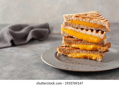 grilled cheese sandwich on gray concrete background - Powered by Shutterstock