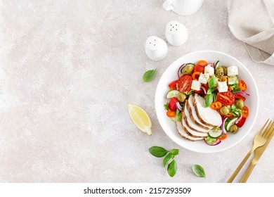 Grilled Chicken Breast And Fresh Greek Salad With Feta Cheese. Top View