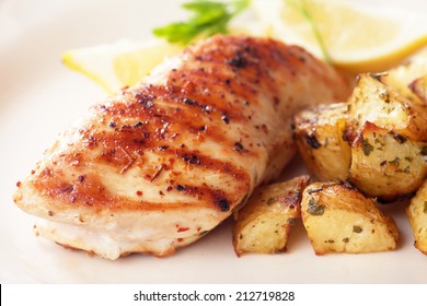 Grilled Chicken Breast With Roasted Potato And Lemon