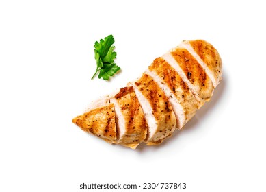 Grilled chicken breast. Sliced spicy roasted chicken fillet isolated on white background.