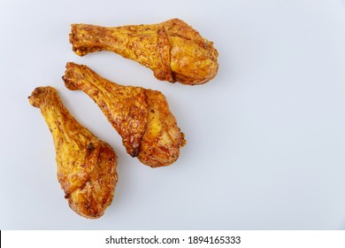 Grilled Chicken Drumsticks Marinated With Buffalo Sauce Isolated On White Background. Top View.