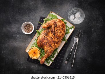 Grilled chicken. Half baked chicken with lemon and spices. Delicious juicy chicken. Grilled poultry. - Shutterstock ID 2140306515