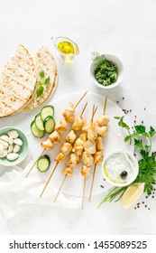 Grilled Chicken Kebab On Skewers And Traditional Greek Tzatziki Yogurt Sauce, View From Above