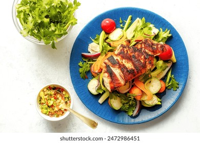 Grilled chicken meat and fresh vegetable salad on white background - Powered by Shutterstock