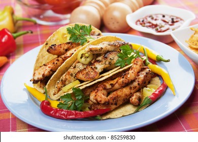 Grilled Chicken Meat And Hot Chili Peppers In Taco Shells