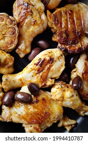 Grilled Chicken Pieces With Kalamata Olives. Top View. Close Up. 