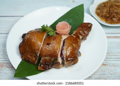 Grilled chicken served with Thai style dipping sauce. with pickled radish