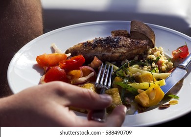 Grilled Chicken With Summer Salad Eaten By Man 