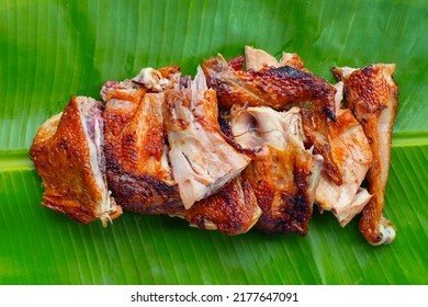 Grilled chicken, Thai style food on banana leaf