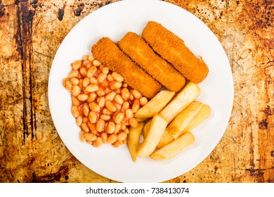 Grilled Cod Fish Fingers With Chunky Chips And Baked Beans In Tomato Sauce, On A Distressed Oven Or Baking Tray