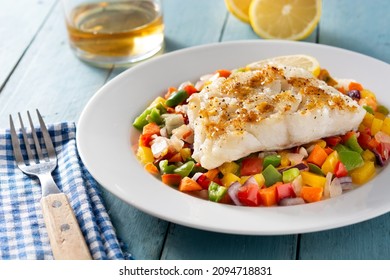 Grilled Cod With Vegetables On Blue Wooden Table