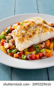 Grilled Cod With Vegetables On Blue Wooden Table