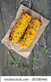 Grilled Corn Cobs On Wooden Background, Top View