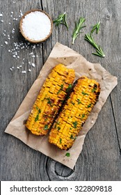 Grilled Corn Cobs On Wooden Background, Top View