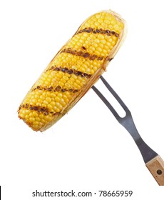 Grilled Corn On The Cob On A Bbq Fork Isolated On White