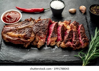 Grilled Cowboy Beef Steak On Stone Background