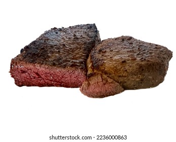 Grilled elk steaks against a white background. - Shutterstock ID 2236000863
