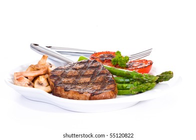 Grilled Eye Of Round Steak Served With Vegetables.