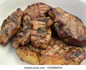 Grilled Fatty Meat. Marbled Beef Steak On A Plate. Pork Meat Pieces Cooked Over Charcoal.