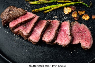 Grilled Fillet Mignon Beef Steak Set, With Onion And Asparagus, On Plate