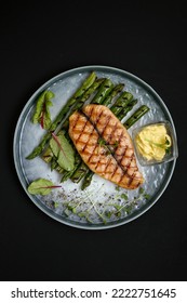 Grilled Fish Fillet With Asparagus, Spinach Leaves And Mustard Sauce