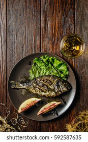 Grilled Fish And Glass Of Wine