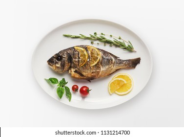 Grilled Fish On Platter Isolated On White. Top View Of Whole Roasted Dorado, Cutout For Menu