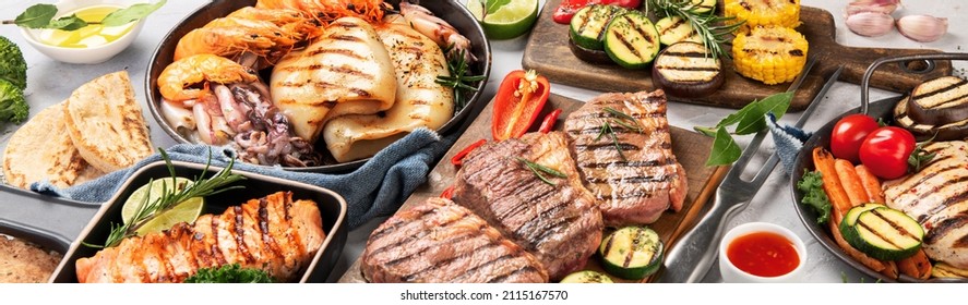 Grilled Fish, Seafood And Meat Assortment On Light Background. Homemade Food Concept. Panorama