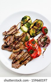 Grilled Flank Beef Steak With Grilled Vegetable On White Plate. Overhead Shot