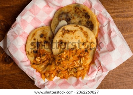 Grilled flat bread stuffed with meat and cheese