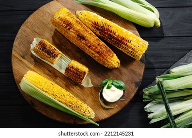 Grilled Food. Charcoal And Grilled Corn. Top View