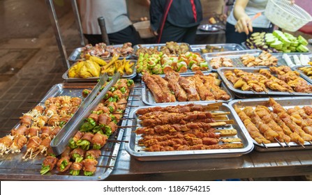 Grilled Foods Of Frog, Chicken, Vegetable, Boar, Pig Spice Ferment Hot And Spicy. BBQ Street Food Local Delicacy In SAPA VIETNAM. Food Is Not Clean.