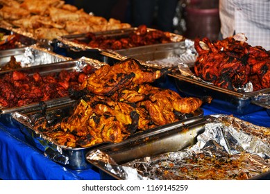 Grilled Or Fried Chicken, Street Food In Indian Ramadan Market In Tilak Nagar Bengaluru India. Muslim Food Festival Iftar Party. 