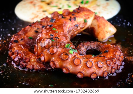 
Grilled Galician octopus leg with sauce