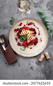 Grilled Halloumi Cheese Salad And Arugula On A Plate With Cranberry Sauce. Fried Cheese Dish, Top View