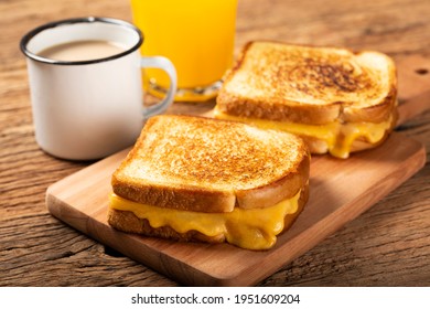 Grilled ham and cheese. Sandwich with cheese and ham on grill. - Powered by Shutterstock