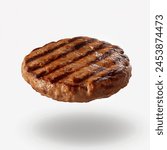 Grilled hamburger meat, beef patty isolated on white background. Cooked beef burger patty and fillet meat flying. Grilled beef burger meat patty floating isolated on white background.