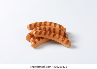 Grilled Hot Dog Sausages Isolated On White Background