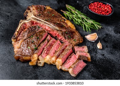 Grilled Italian Florentine Or T Bone Beef Meat Steak. Black Background. Top View.