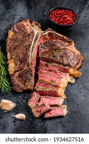 Grilled Italian Florentine Or T Bone Beef Meat Steak. Black Background. Top View.