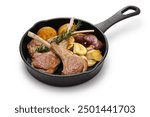 grilled lamb chops and vegetables on skillet