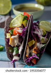 Grilled Mahi Mahi Fish Tacos In Blue Corn Taco Shells.