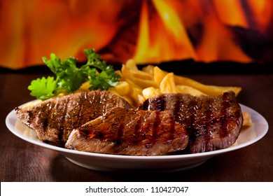 Grilled Meat With French Fries