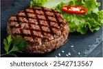 Grilled Meat Patty: A seared grilled patty with a glossy exterior, served with fresh lettuce, red chili pepper, and parsley, placed on a dark stone surface.