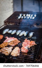 Grilled Meat And Sardines At The Feast Of St Anthony In Lisbon, Portugal
