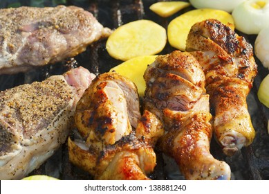 grilled meats and vegetables on roast