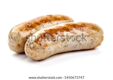 Grilled Munich Veal Sausages, close-up, isolated on white background.